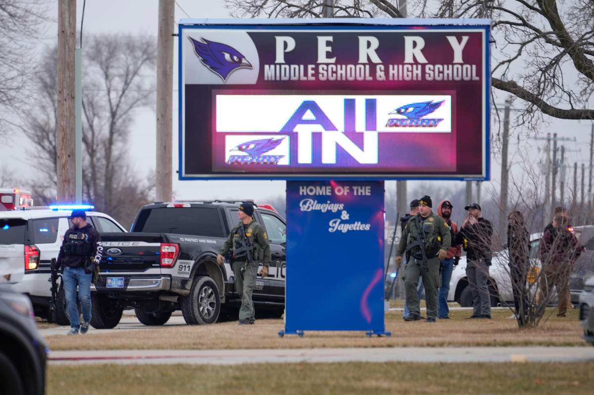 Police respond to Perry High School in Perry, Iowa., Thursday, Jan. 4, 2024.