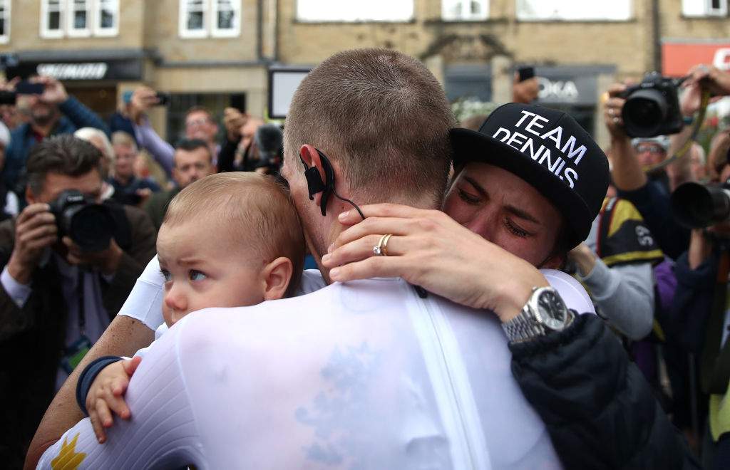 FILE - Australia's Rohan Dennis celebrates winning gold with his wife Melissa Hoskins and their son during the Men's Elite Individual Time Trials from Northallerton to Harrogate.