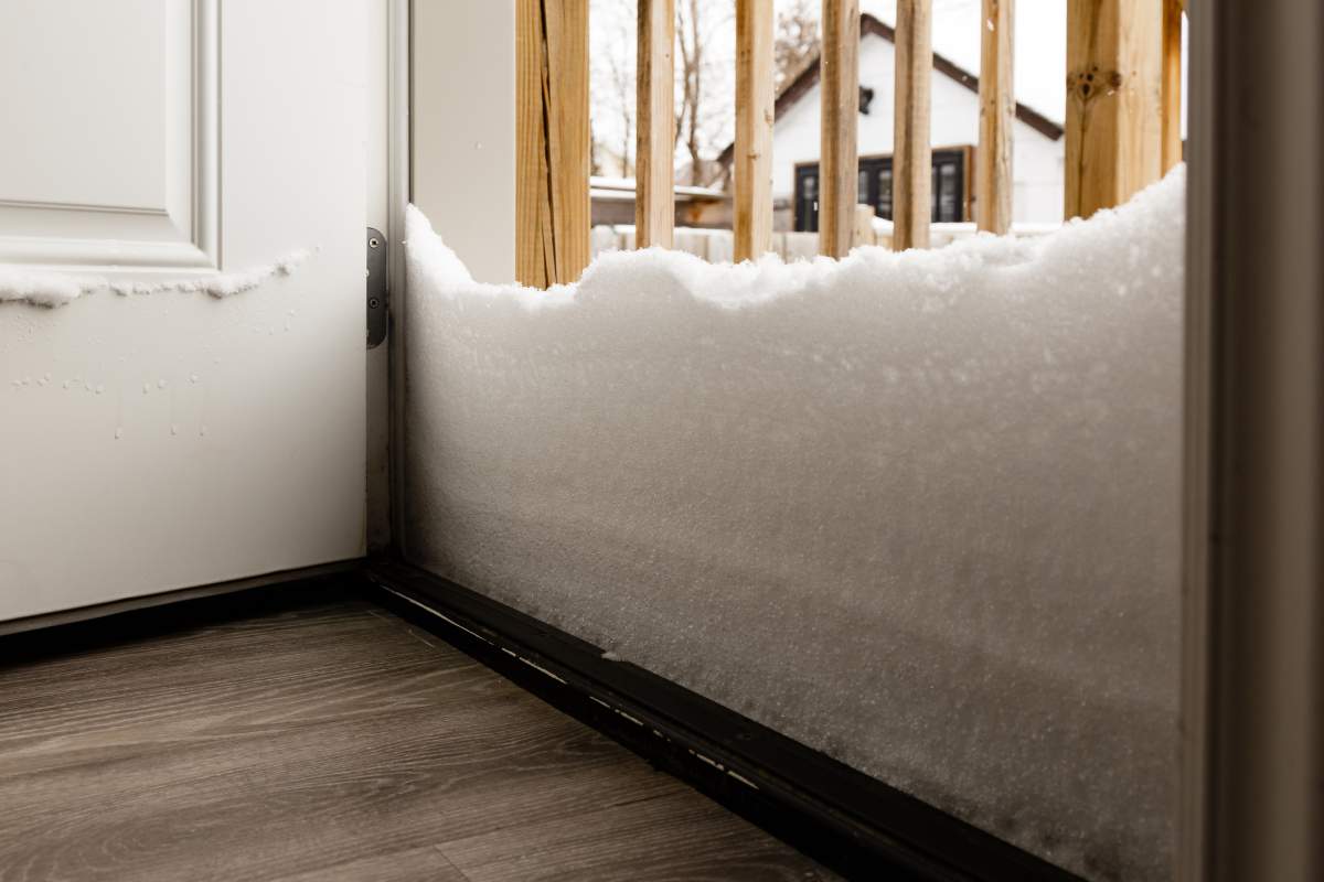 snow piled up at front door