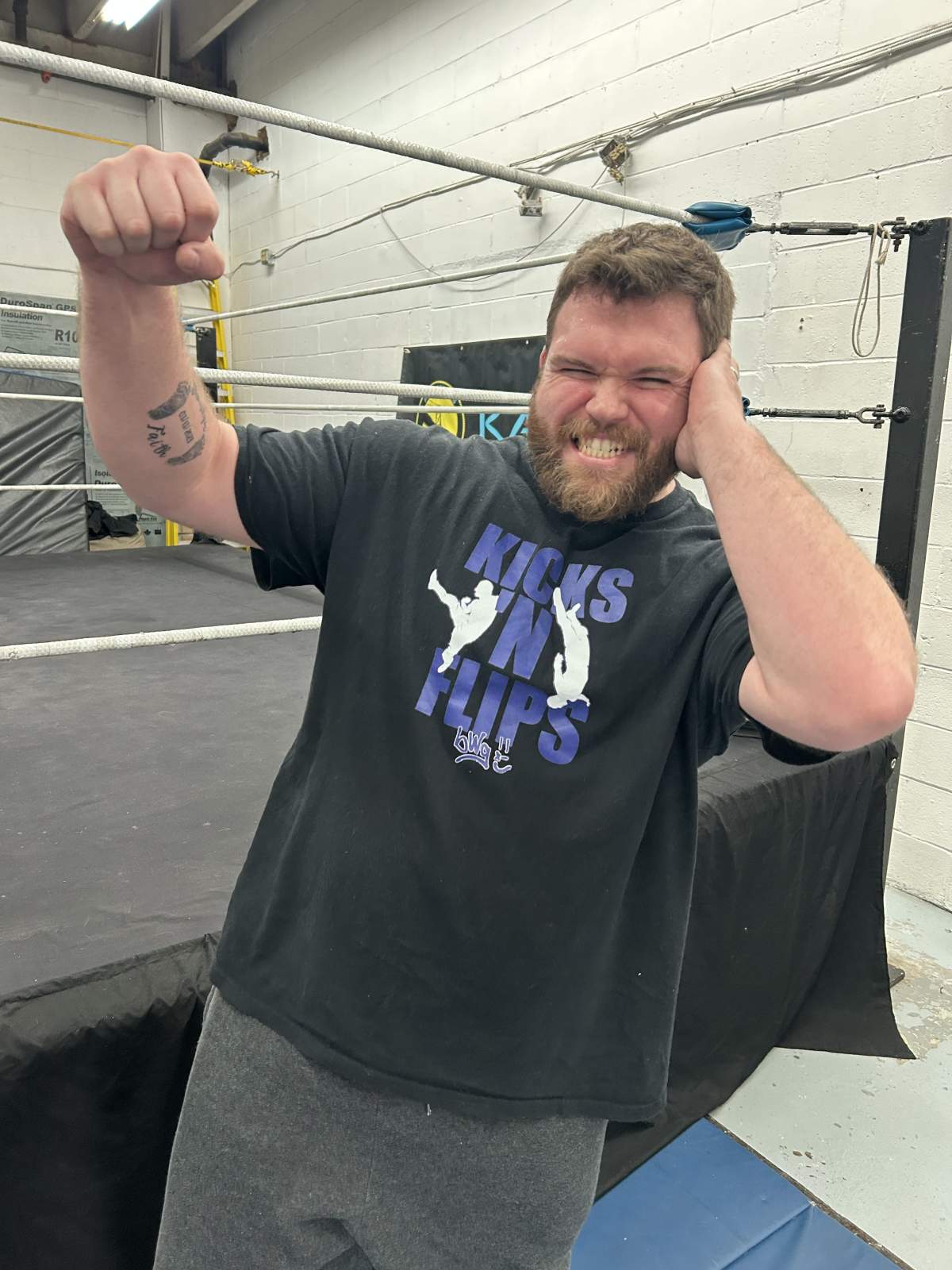 “Deaf Power” does his signature pose outside of the ring.