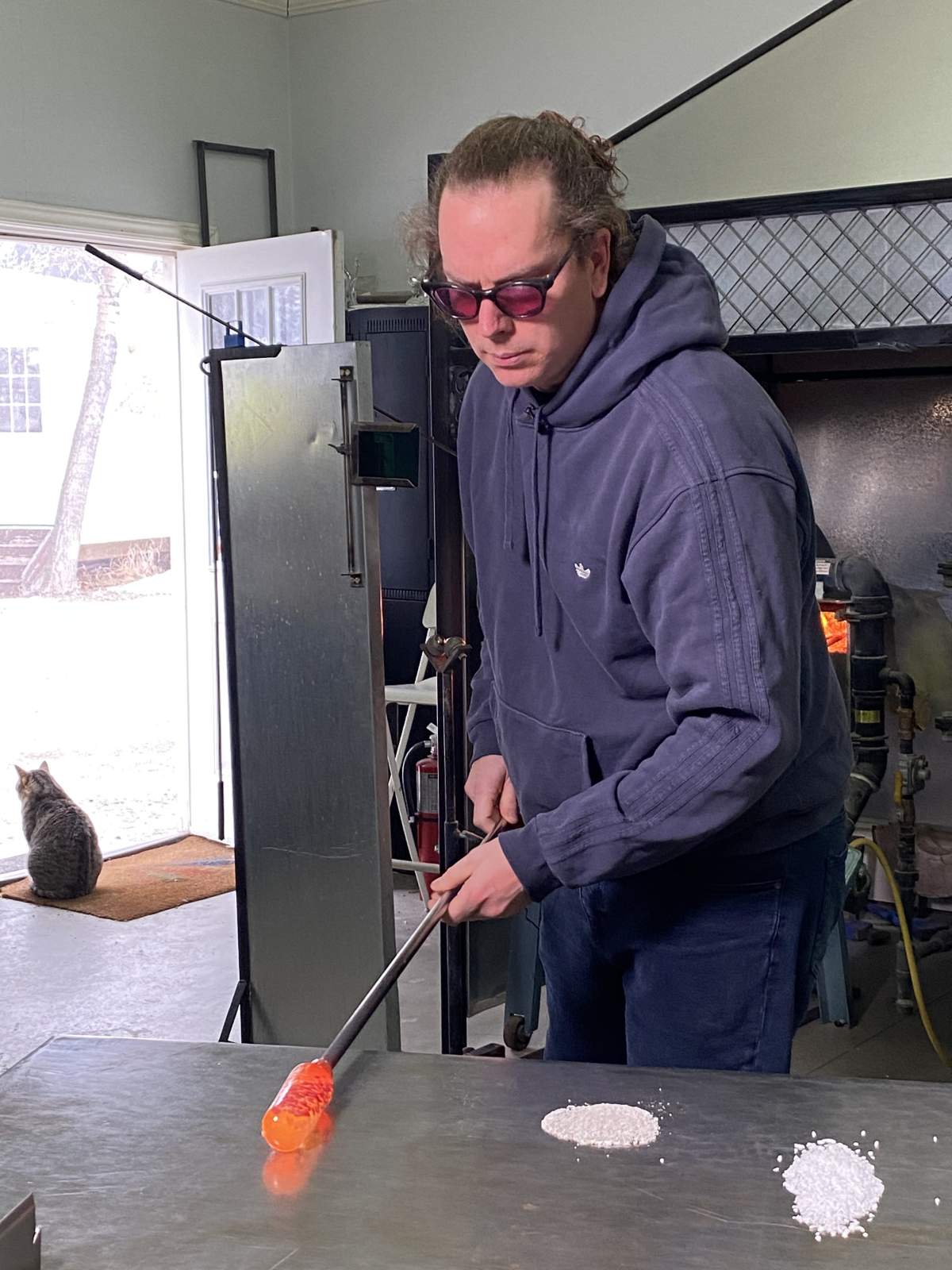 David Blankenstyn creating a blown glass memorial piece on Jan. 3, 2024.