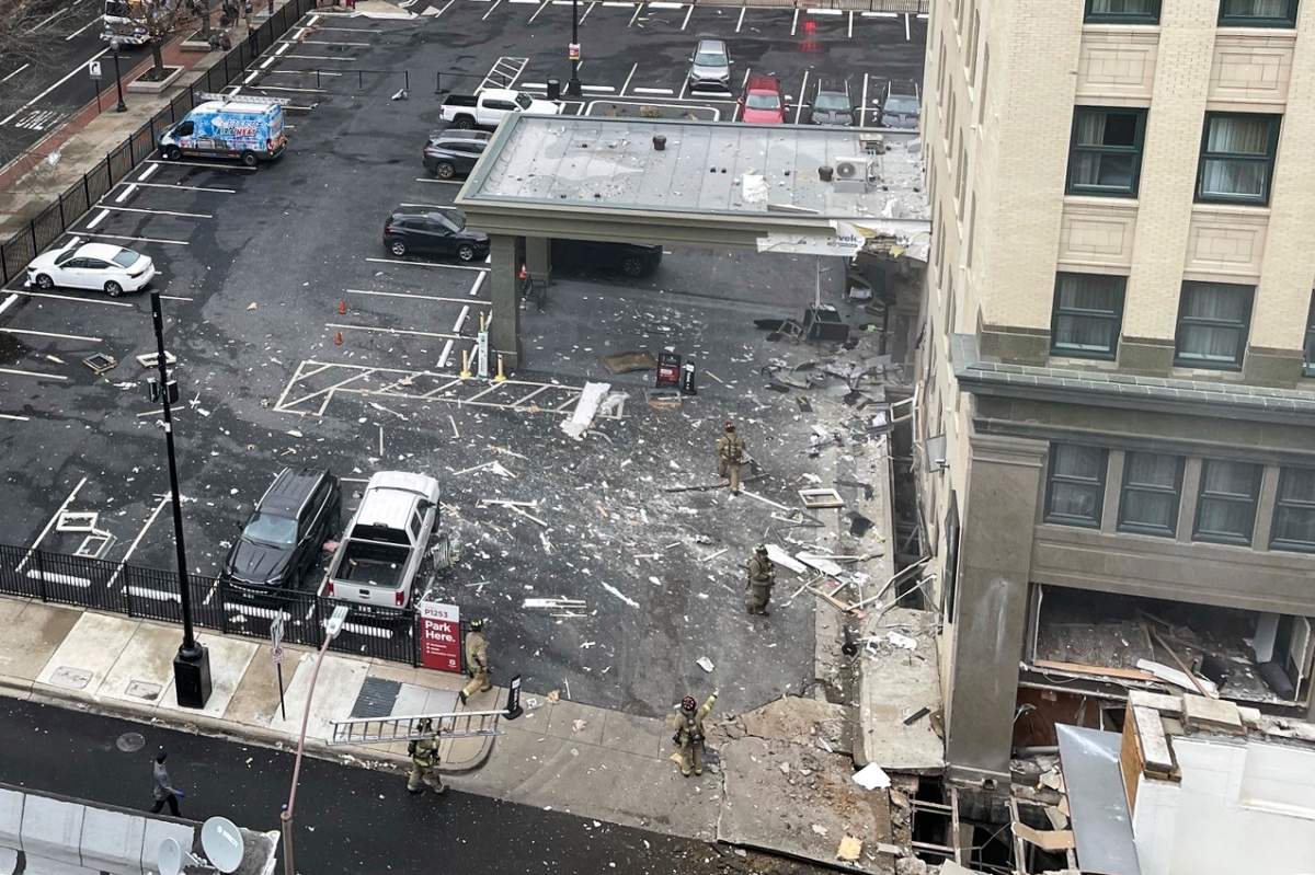 Firefighters work the scene after an explosion at the Sandman Signature hotel on Monday, Jan. 8, 2024, in Fort Worth, Texas. (Kathy Johnson/Special to the Star-Telegram via AP)