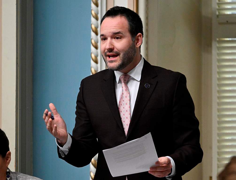 Quebec Culture and Communication Minister Mathieu Lacombe responds to the Opposition during question period, Wednesday, April 26, 2023, at the legislature in Quebec City. Quebec is considering legislation to boost French content on streaming platforms as it seeks to fight back against the overwhelming influence of American digital culture and corporations.THE CANADIAN PRESS/Jacques Boissinot.