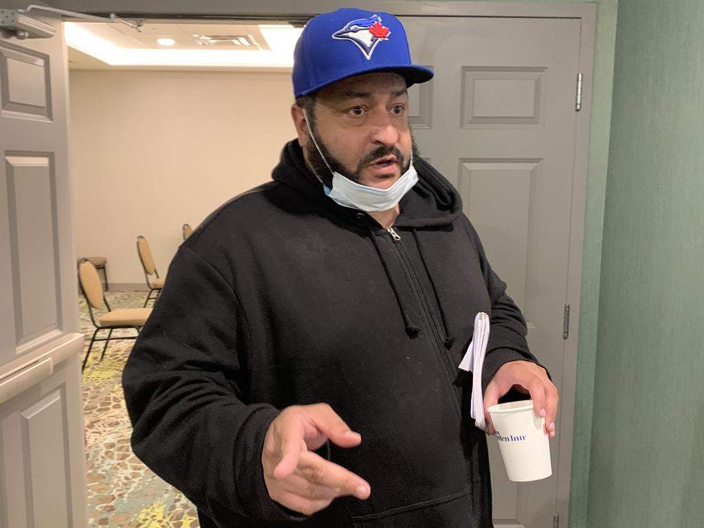 Adam LeRue, 42, comes out of a Nova Scotia Police Review Board hearing in Halifax on July 15, 2020. A Police Review Board has ruled that a Halifax officer who arrested a couple who had stopped in a city park after hours should be suspended without pay for two weeks. THE CANADIAN PRESS/Michael Tutton.