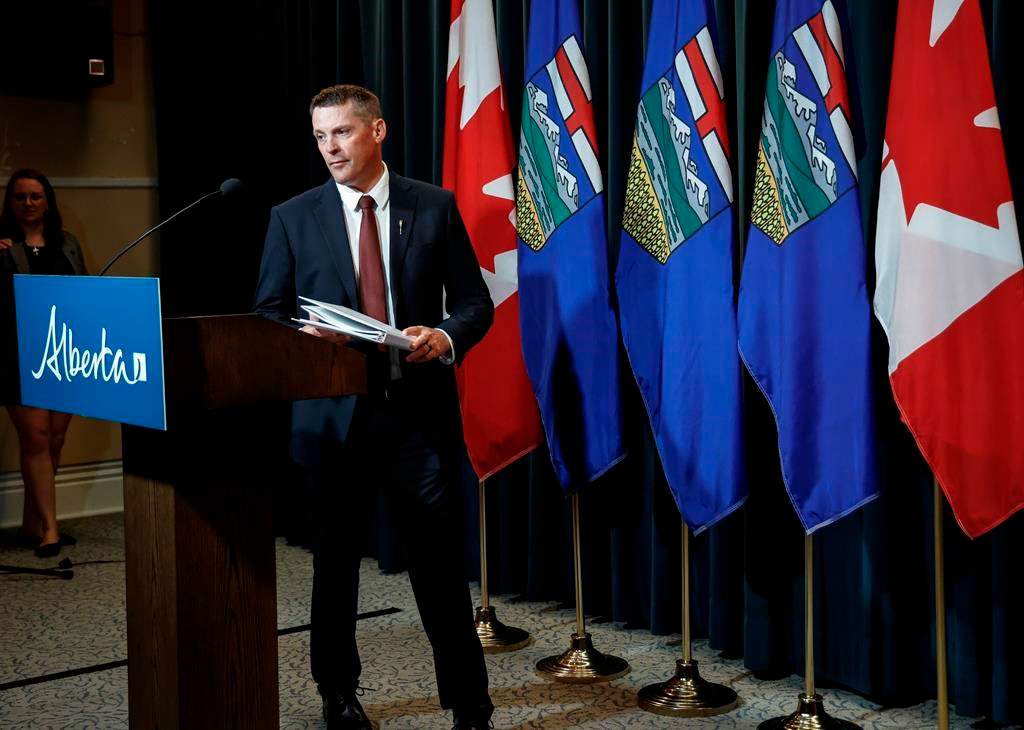 Alberta Finance Minister Nate Horner arrives to speak to the media at a news conference in Calgary, Thursday, June 29, 2023. Albertans will have to wait until the fall before they learn what the federal government thinks they should get if the province quits the Canada Pension Plan. THE CANADIAN PRESS/Jeff McIntosh