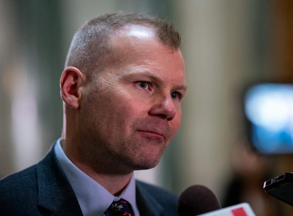 Dustin Duncan speaks to the media in Regina, THE CANADIAN PRESS/Heywood Yu.