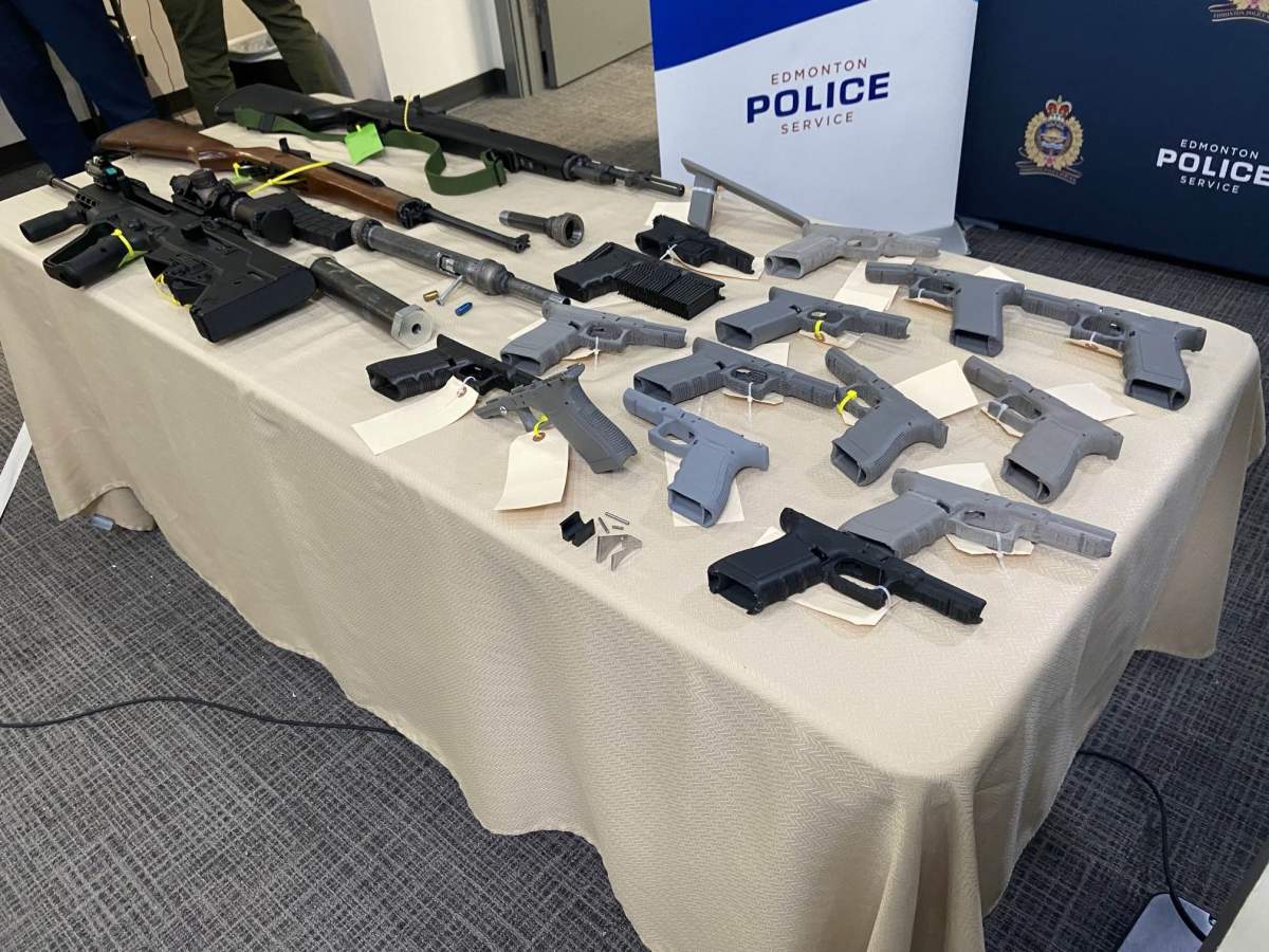 A 29-year-old Edmonton man is facing more than 40 charges after 3D-printed firearms were seized following an investigation with ties to Quebec.