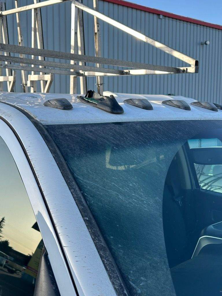 A brick damaged this truck after being thrown onto Whitemud Drive from the 53 Avenue overpass in south Edmonton on Thursday, Feb. 22, 2024.