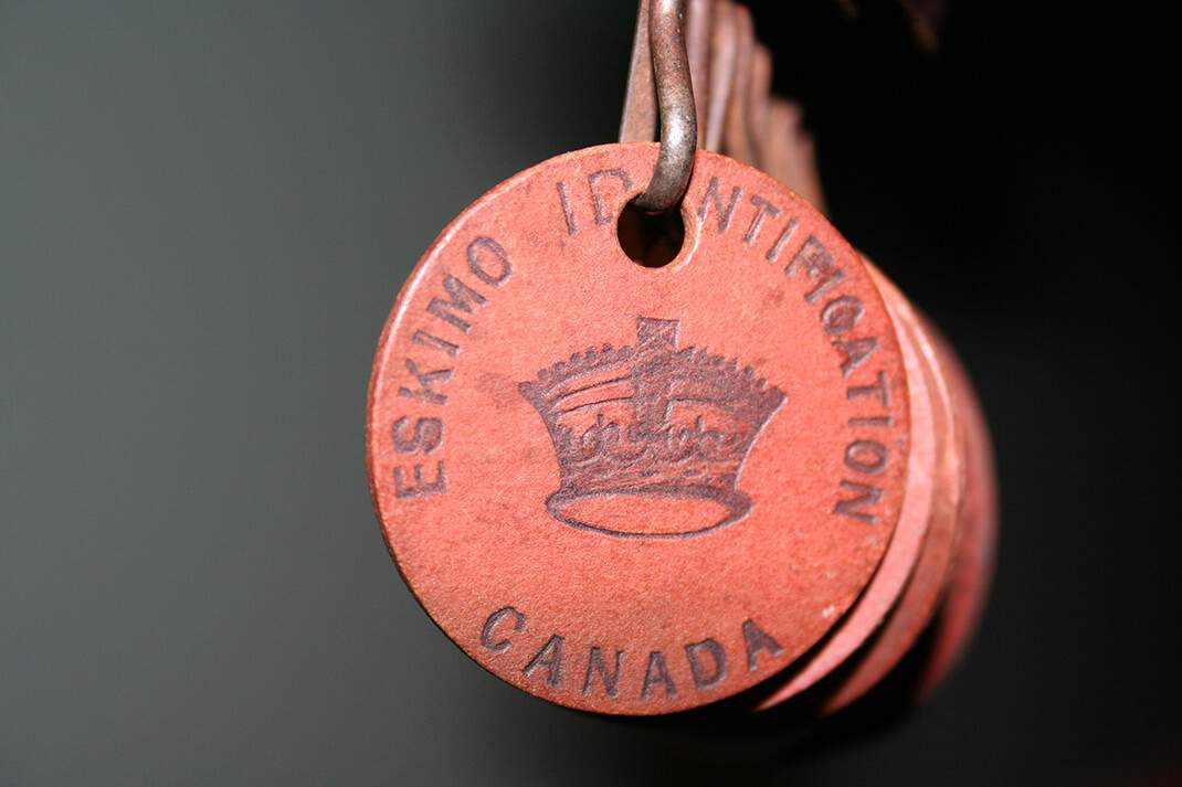 An image of a tag that was issued by the federal government's "Eskimo Identification Tag System,"