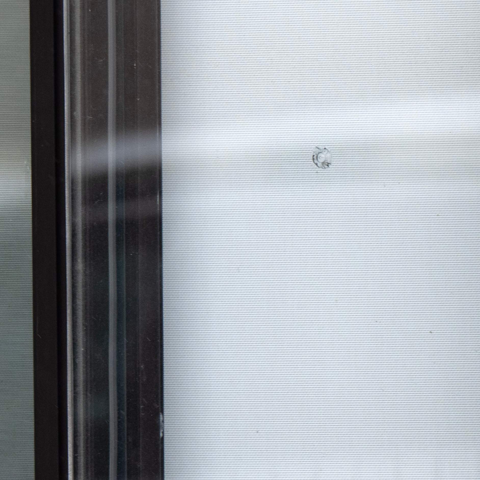 Bullet hole in window at Talmud Tora school after shots were fired at two Jewish schools in Montreal on Nov. 9, 2023. THE CANADIAN PRESS/Ryan Remiorz