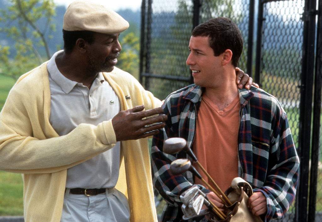 Carl Weathers talks to Adam Sandler in a scene from the film 'Happy Gilmore', 1996.