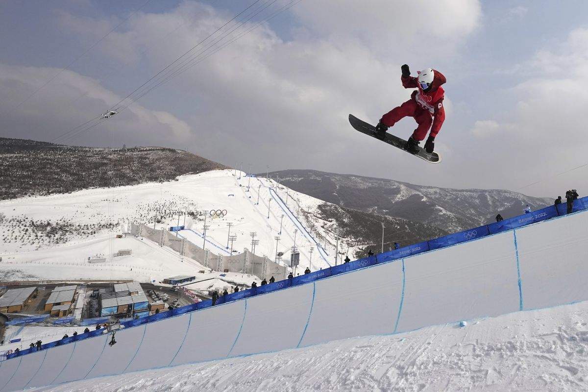 Canada's Liam Gill competes during the men's halfpipe qualification round at the 2022 Winter Olympics, Wednesday, Feb. 9, 2022, in Zhangjiakou, China. When Liam Gill felt he didn't belong, snowboarding came to his rescue.