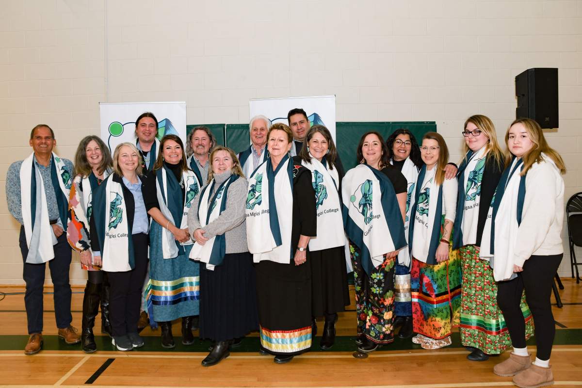 Trent University executives, members of Doug Williams-ban family, and other event participants after the Gidigaa Migizi College scarf ceremony.