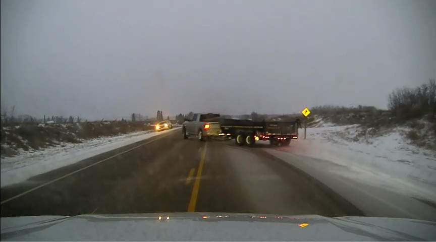 Dashcam image of a stolen truck and trailer evading Alberta RCMP near Saddle Lake Cree Nation on Feb. 8, 2024.