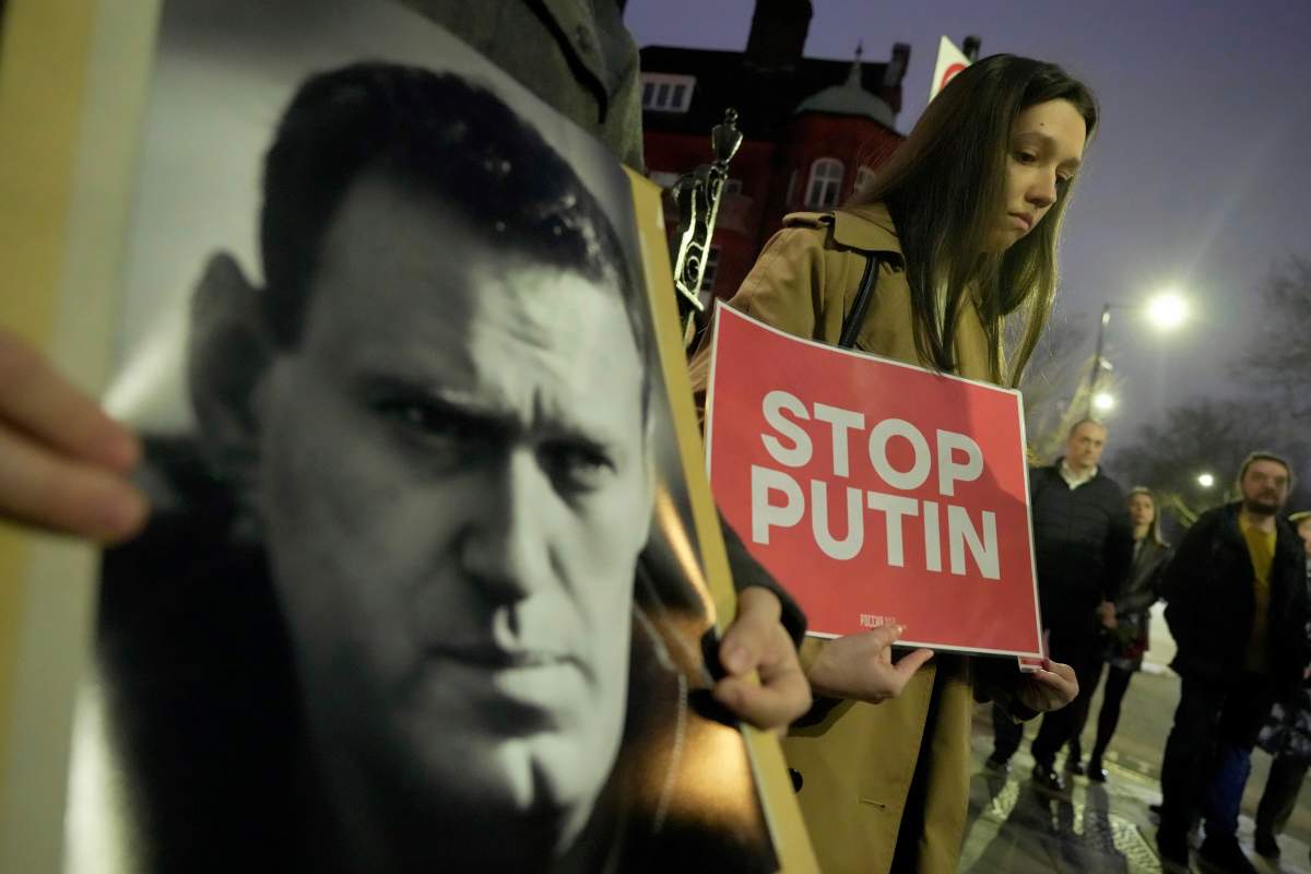 Protesters stage a demonstration opposite the Russian Embassy in London, Friday, Feb. 16, 2024. Alexei Navalny, who crusaded against official corruption and staged massive anti-Kremlin protests as President Vladimir Putin’s fiercest foe, has died in the Arctic penal colony where he was serving a 19-year sentence. That’s according to Russia’s prison agency. He was 47. (AP Photo/Kin Cheung)