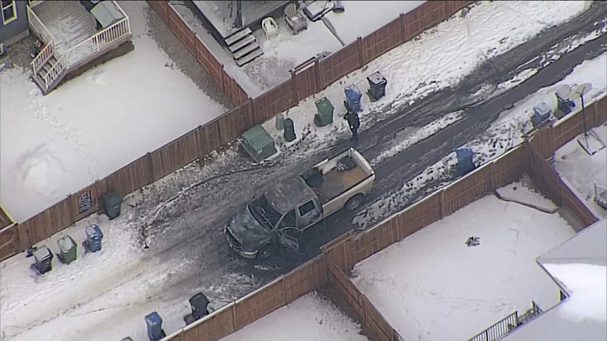 A burned truck in Calgary's Evanston neighbourhood Thursday, Feb. 15, 2024.