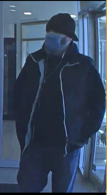 The Calgary Police Service is looking for a man who is believed to be involved in a bank robbery on Saturday morning.