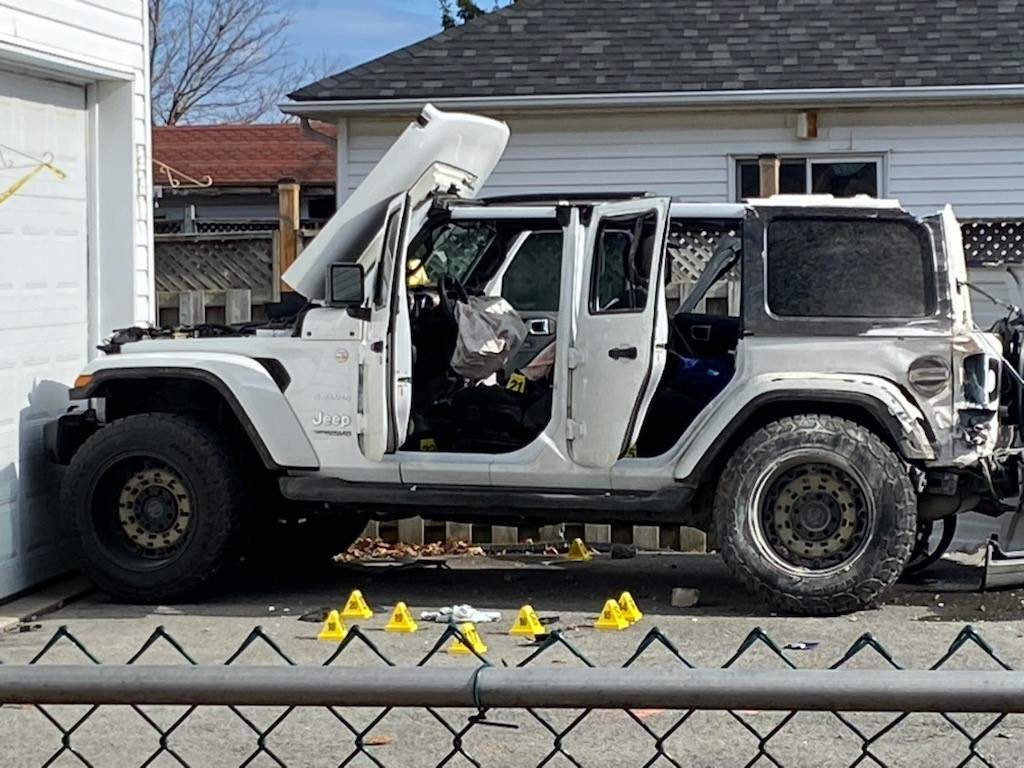 Evidence markers can be seen around the truck.
