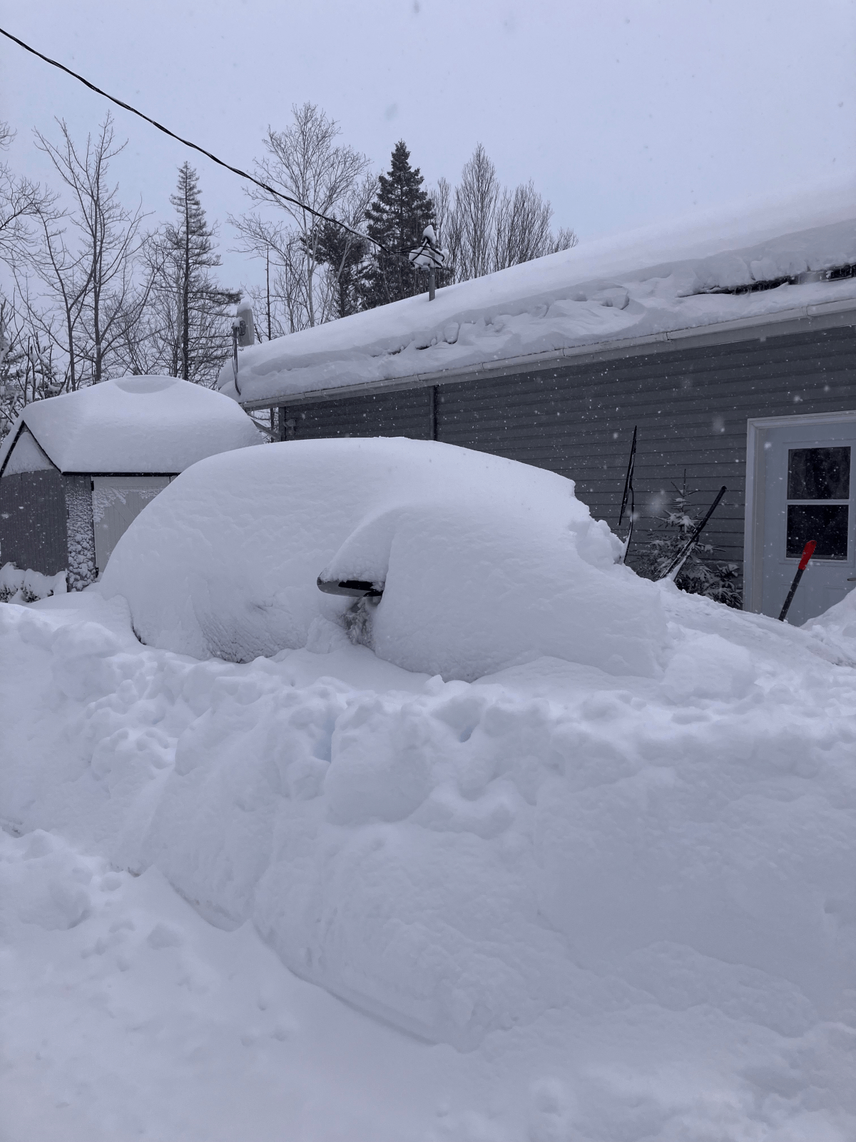 This picture sent in by a viewer shows a car buried in snow.