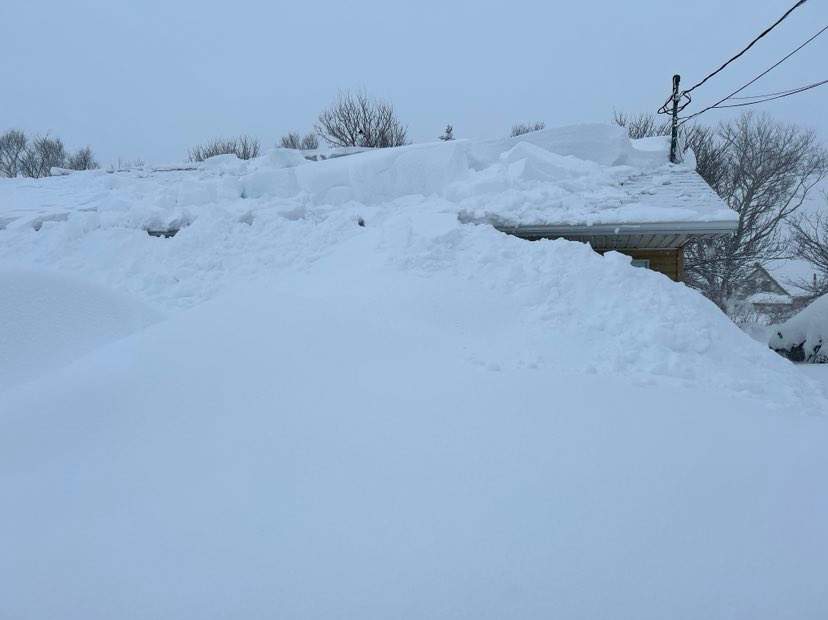 Pam Leader’s home in Glace Bay, N.S. in Cape Breton is barely visible after a relentless multi-day snow storm dumped more than 100 cm of snow in parts of Nova Scotia.