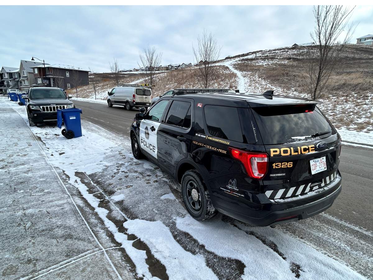 A major police presence in northwest Calgary along Sage Meadows Way Thursday, Feb. 15, 2024.