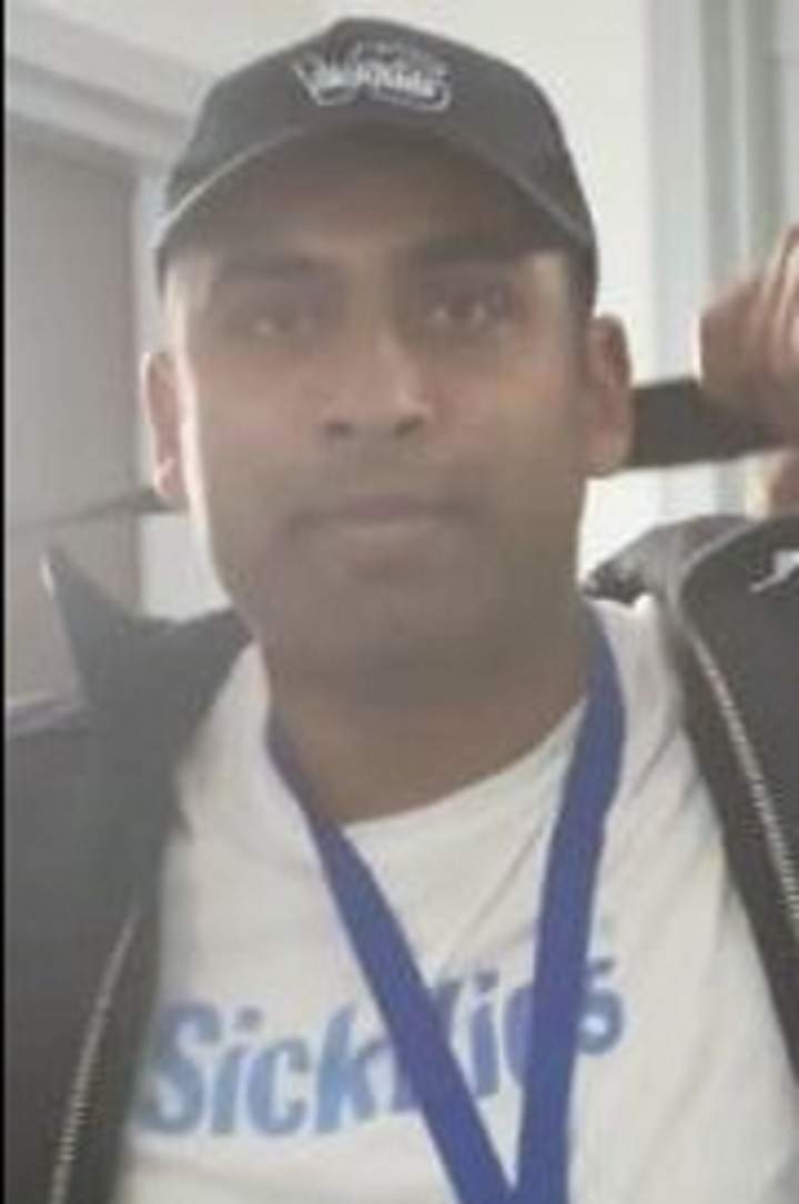 One of two images of a suspect released by police Saturday.