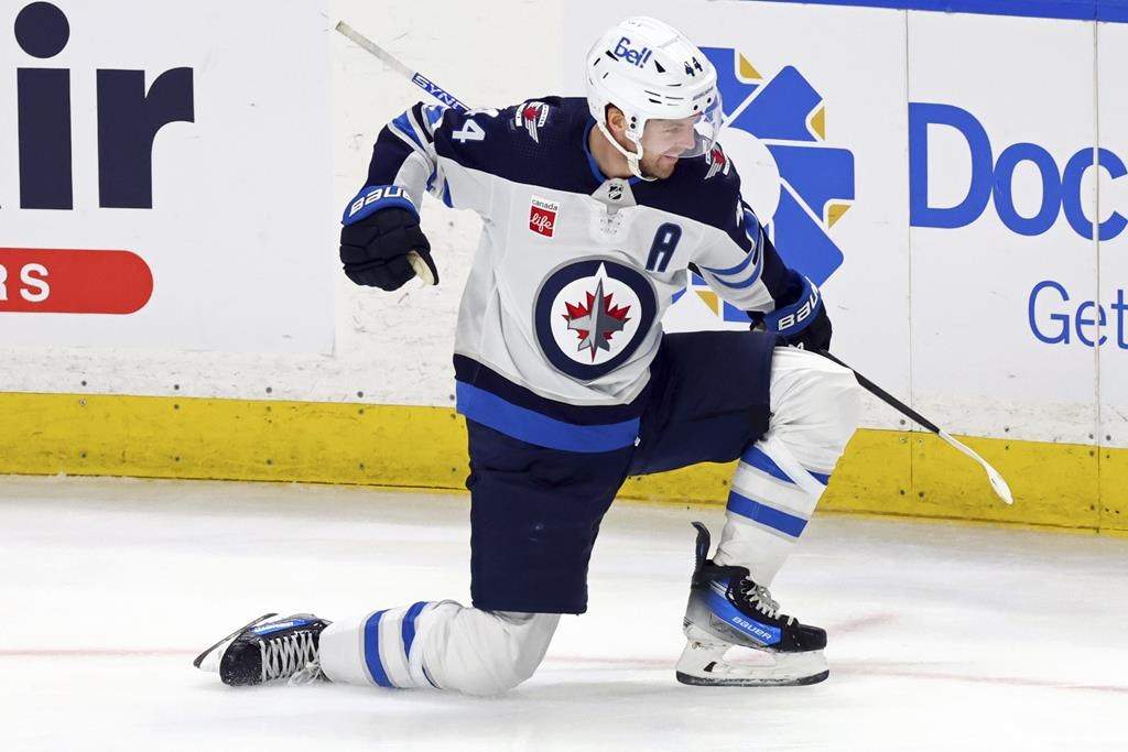 Winnipeg Jets defenceman Josh Morrissey (44) celebrates after his goal during the third period of an NHL hockey game against the Buffalo Sabres on March 3, 2024, in Buffalo, N.Y. Defencemen swept the latest NHL player of the week awards, with Nashville's Roman Josi, Florida's Brandon Montour and Winnipeg's Morrissey earning honours.