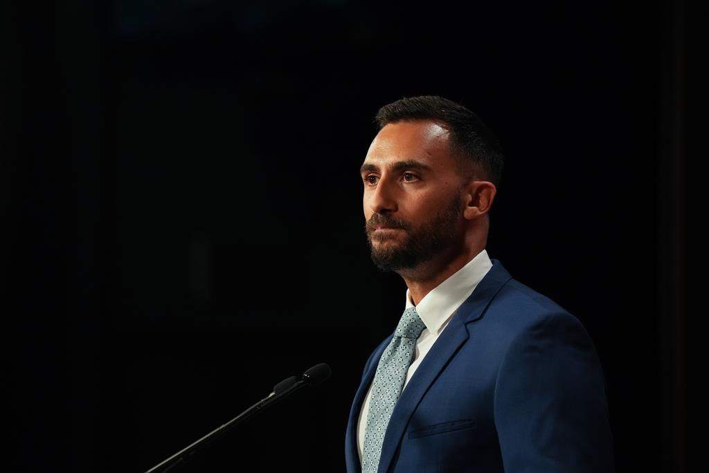 Ontario Education Minister Stephen Lecce speaks to media at the Queen's Park Legislature in Toronto on Friday August 25, 2023. Lecce says the province has reached a tentative contract deal with the province's Catholic teachers. 