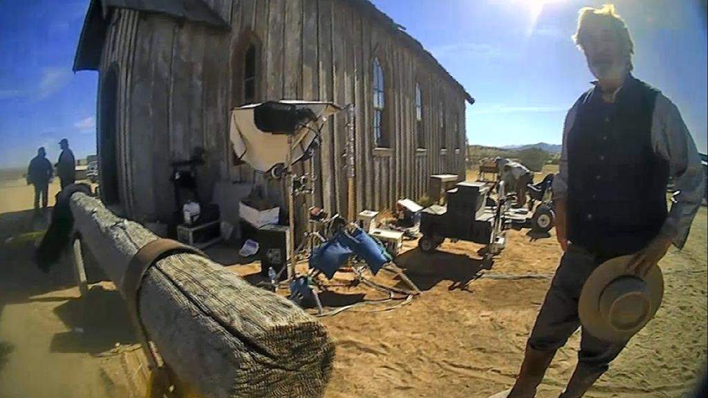 FILE – In this image taken from video released by the Santa Fe County Sheriff’s Office, Alec Baldwin speaks with investigators following a fatal shooting on the ‘Rust’ movie set in Santa Fe, N.M.