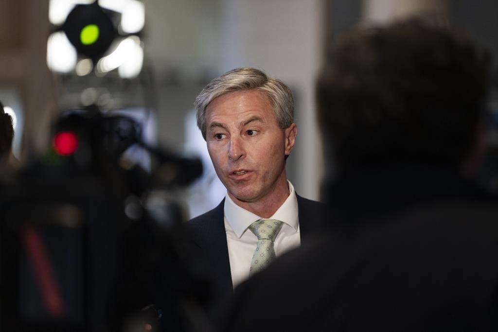 An Australian document filed in its wine pricing trade case against Canada and three provinces contains a passage quoting Nova Scotia Premier Tim Houston. Houston speaks to reporters after the provincial budget was tabled at the Nova Scotia legislature in Halifax, Thursday, Feb. 29, 2024. THE CANADIAN PRESS/Darren Calabrese.