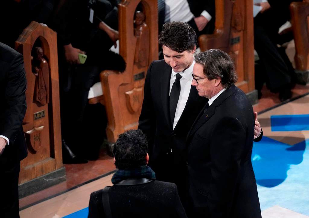 Prime minister Justin Trudeau and Canadian businessman Pierre Karl Péladeau arrive at the funeral of former prime minister Brian Mulroney, in Montreal, Saturday, March 23, 2024.