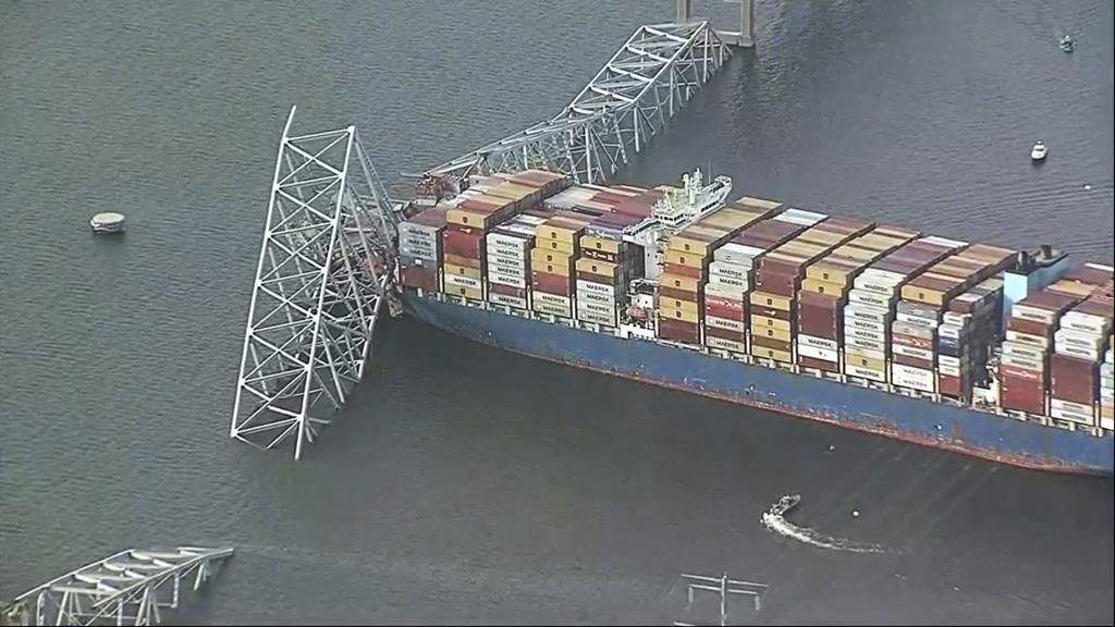 Parts of the Francis Scott Key Bridge remain after a container ship collided with one of the bridge’s support Tuesday, March 26, 2024 in Baltimore.