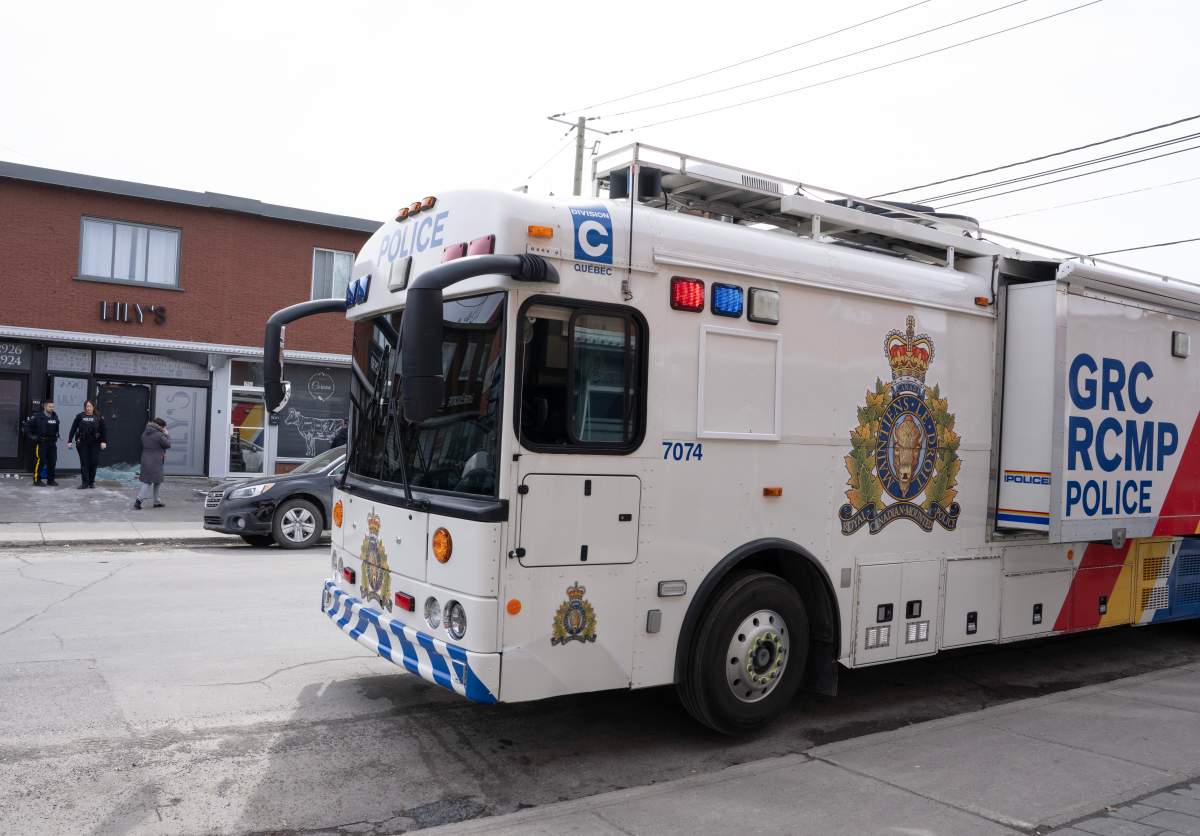 An RCMP vehicle is parked outside a Montreal bar.