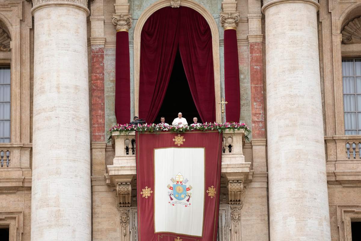 Pope Francis stands on the central balcony of the St. Peter’s Basilica prior to the ‘Urbi et Orbi’ (To the city and to the world) blessing, at the Vatican, Sunday, March 31, 2024.