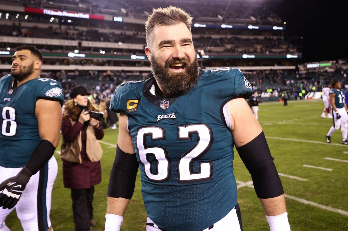 Jason Kelce in his #62 Eagles Jersey. He is smiling.
