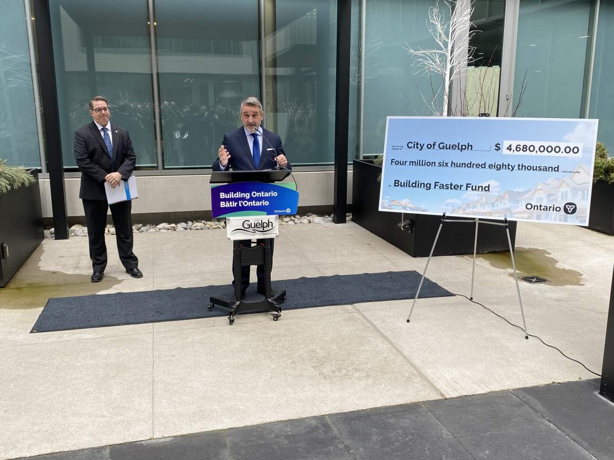 Housing minister Paul Calandra was in Guelph earlier this year to announce funding for the city for meeting housing targets.