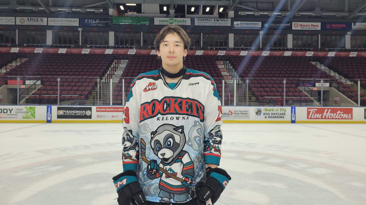 Hiroki Gojsic of the Kelowna Rockets shows the jersey that the team will give away following Saturday night’s home game against the Vancouver Giants.