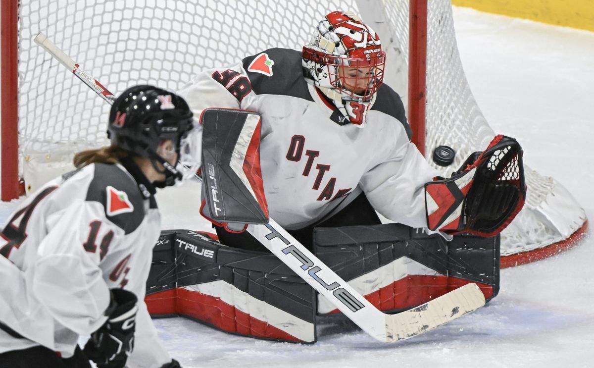 Ottawa goaltender Emerance Maschmeyer is scored on by Montreal's Tereza Vanisova (not shown) during first period PWHL hockey action in Montreal, Saturday, February 24, 2024.