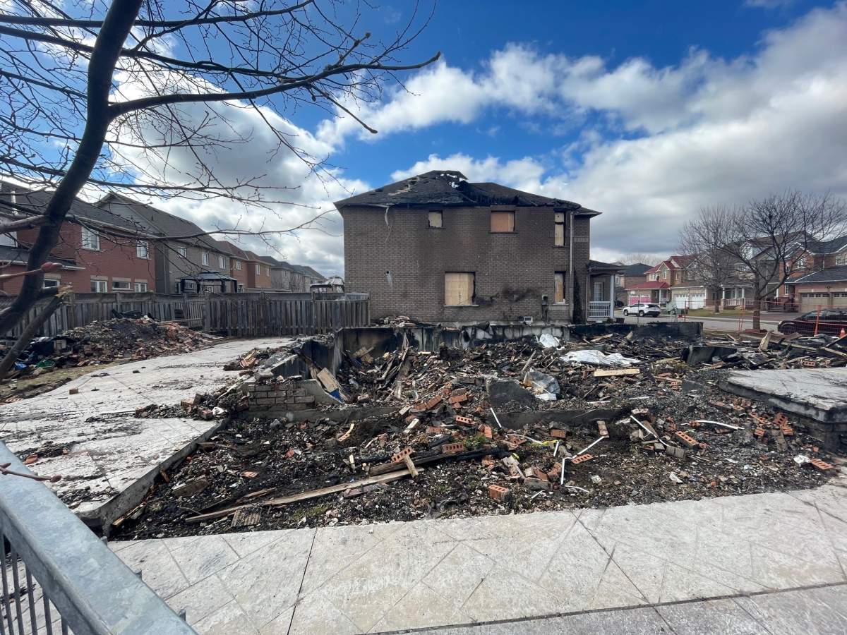 An image of the home following a fatal fire that claimed the lives of a family of three in Brampton.