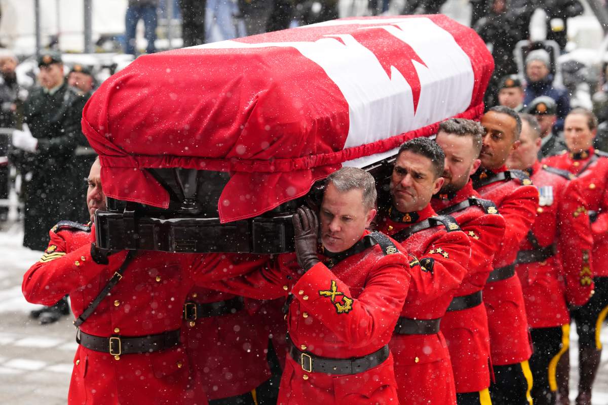 RCMP pallbearers carry the casket to the funeral of the former prime minister Brian Mulroney, in Montreal, Saturday, March 23, 2024.