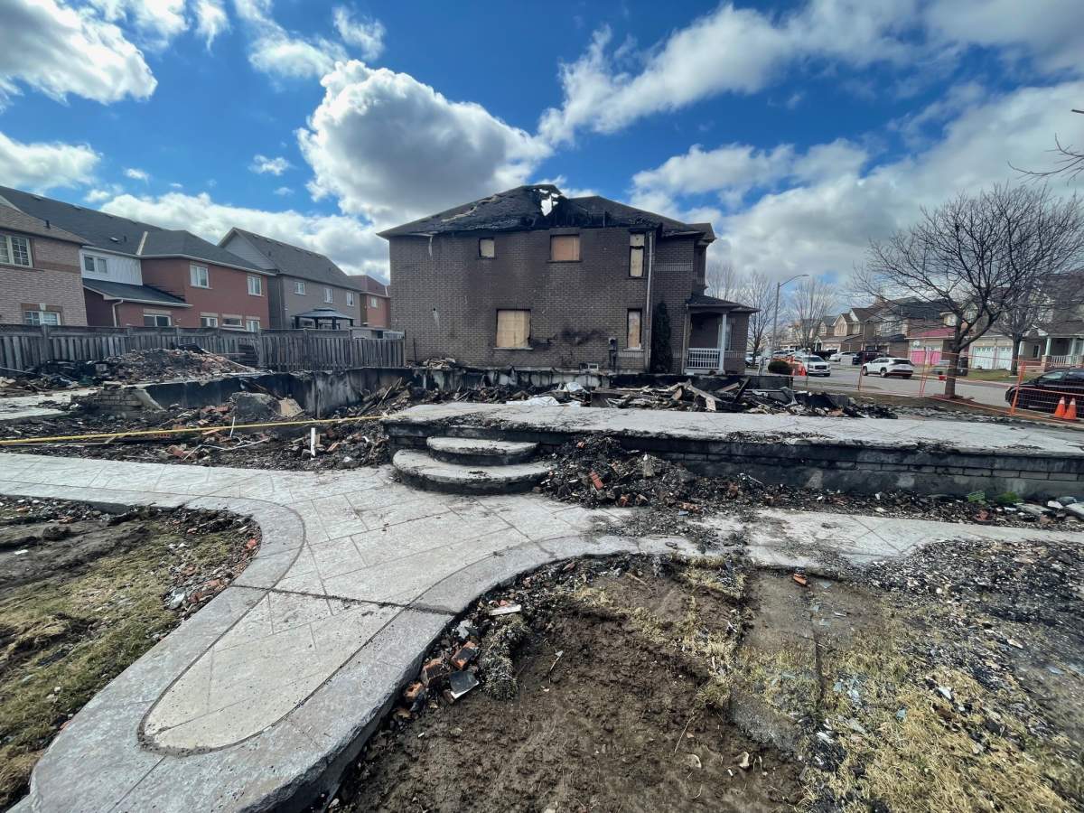 An image of the home following a fatal fire that claimed the lives of a family of three in Brampton.