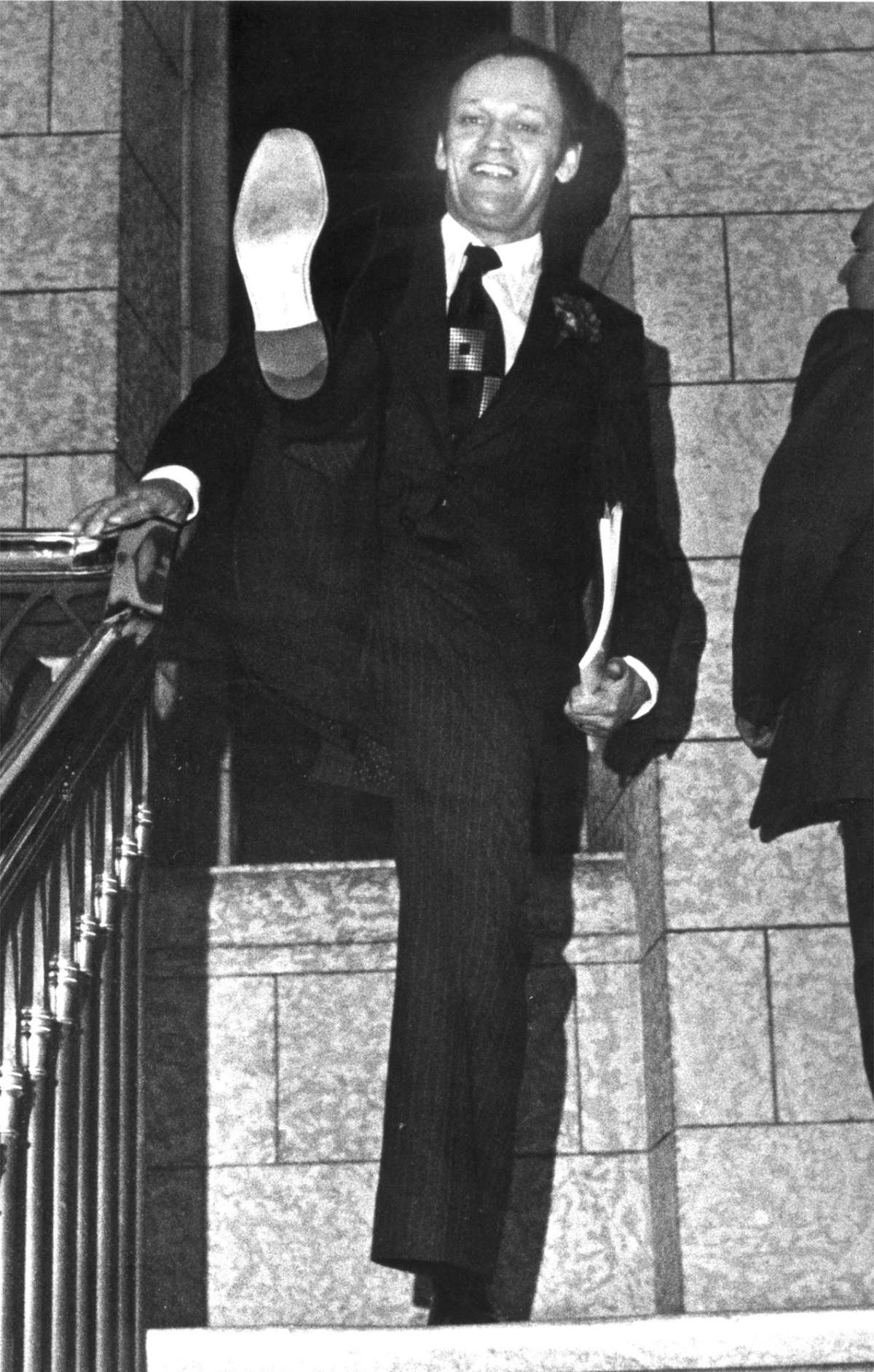 This is an April 10, 1978, photo of then Finance Minister Jean Chretien kicking up his heels and baring the sole of one of his new pair of shoes as he left the Parliament Building in Ottawa after presenting his budget.