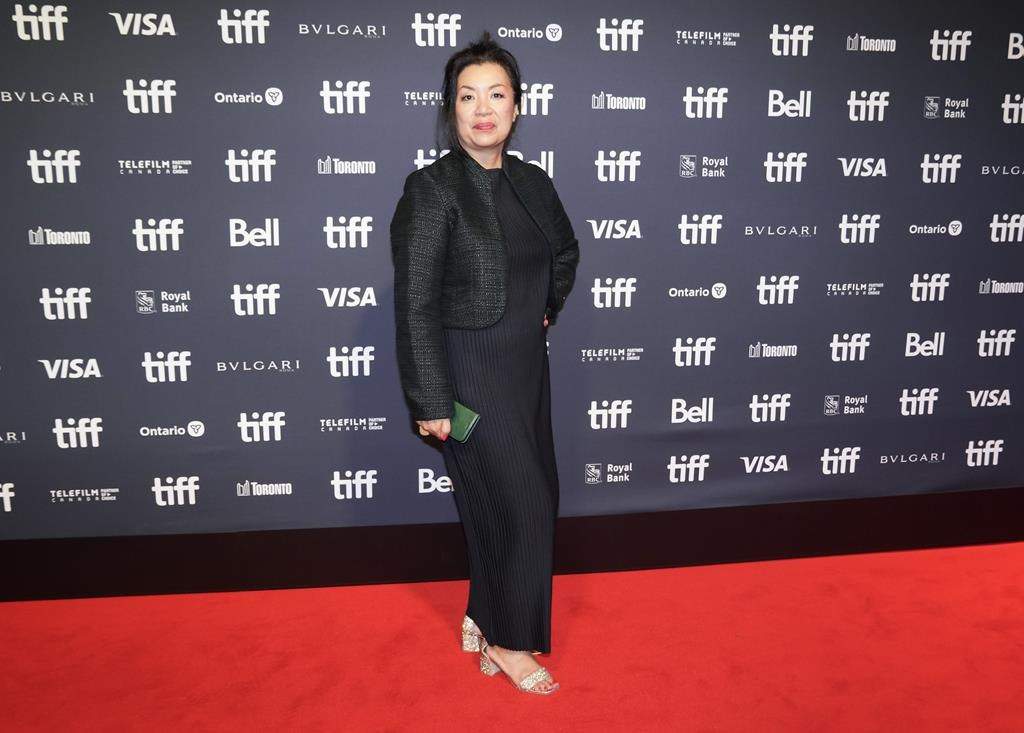 Tens of millions of dollars are allocated to arts festivals in this year's federal budget, which recipients say is a welcome infusion of cash for the beleaguered sector. TIFF's Chief Programming Officer, Anita Lee poses for a photograph on the red carpet for the new movie "The Boy And The Heron" at the Toronto International Film Festival in Toronto on Thursday, Sept. 7, 2023. THE CANADIAN PRESS/Nathan Denette.