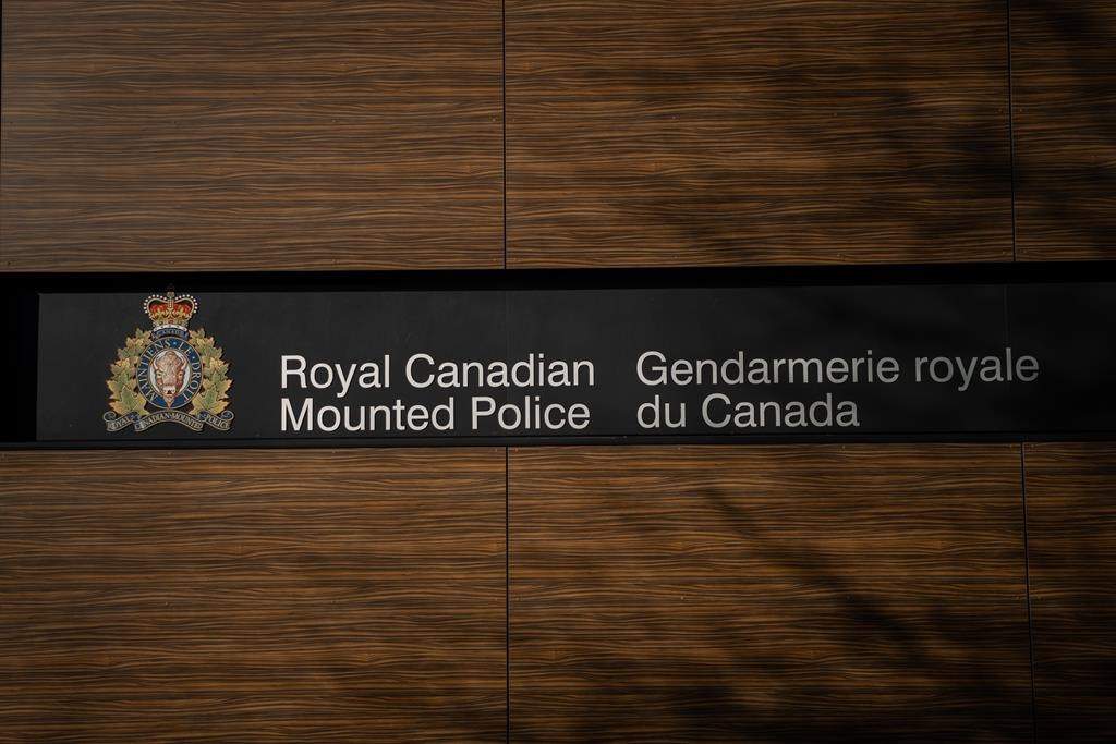 The B.C. RCMP Divisional Headquarters is seen, in Surrey, B.C., on Thursday, Jan. 11, 2024. The first police officer to enter a room where a woman was being held hostage in 2019 has told a B.C. coroner's inquest that he saw her lying on a bed on top of her captor, who was holding a knife to her throat with a gun in his other hand. THE CANADIAN PRESS/Ethan Cairns.