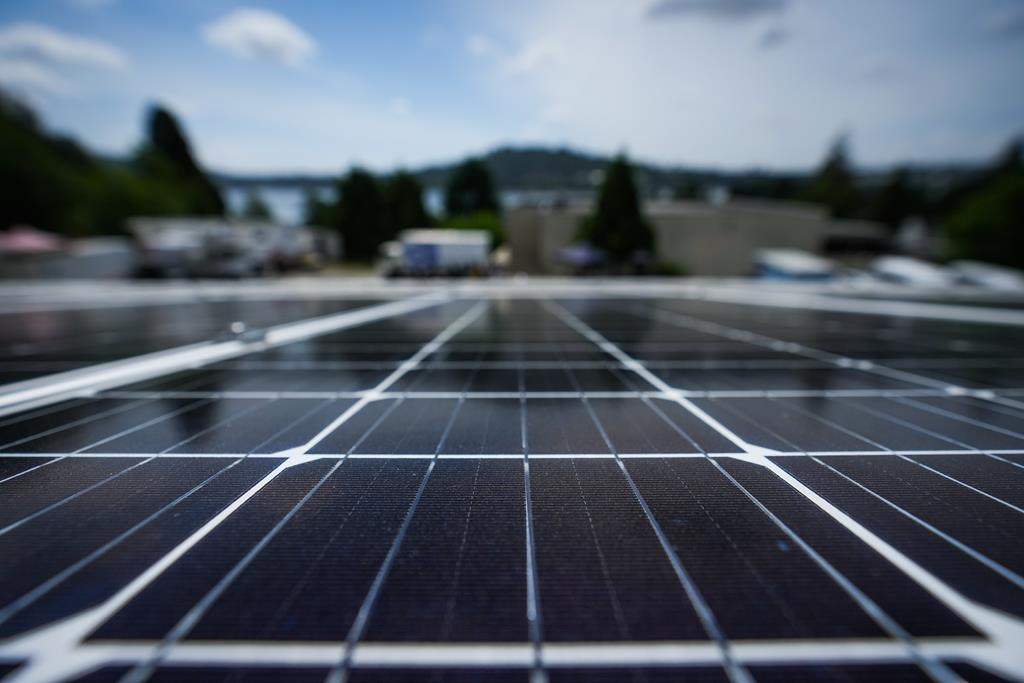 A First Nation in central British Columbia is getting what the federal government says will likely be the largest off-grid solar project in Canada. A solar panel array is seen outside the administration building at the Tsleil-Waututh Nation, in North Vancouver, B.C., Thursday, June 15, 2023. THE CANADIAN PRESS/Darryl Dyck.