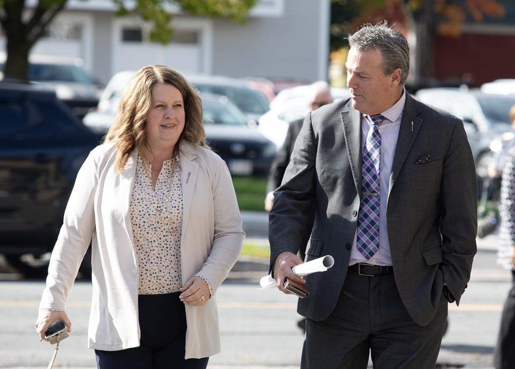 New Brunswick's tourism minister is defiant in the face of criticism from Opposition members who are questioning the benefits of a costly one-week trip to Europe. MLA’s Tammy Scott-Wallace and Mike Holland arrive at the New Brunswick Legislative Building, in Fredericton, Tuesday, Oct. 17, 2023. THE CANADIAN PRESS/Ron Ward.