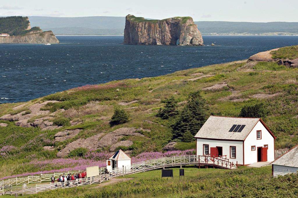 Tens of thousands of visitors flock to Quebec’s storied Iles-de-la-Madeleine every summer to behold its cliff-framed seascapes and wide sandy beaches. But starting next month, those island sojourns will come with an added cost. The Bonaventure Island is shown overlooking the Perce rock on July 25, 2012.