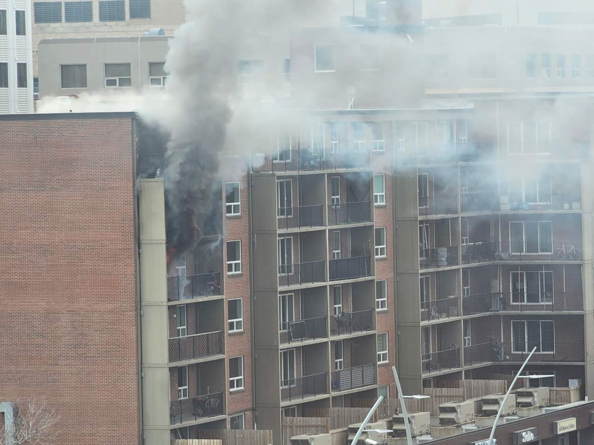A person was rescued from a fiery balcony as fire crews battled a blaze at an apartment building in the area of Jasper Avenue and 110th Street in Edmonton Thursday, April 25, 2024.