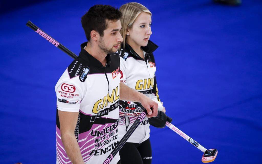 Kadriana and Colton Lott discuss strategy at the Canadian Mixed Doubles Curling Championship in Calgary, Wednesday, March 24, 2021. The team was ousted from the world mixed doubles curling championship after suffering a 6-5 loss to Estonia in a playoff qualification game on Friday.THE CANADIAN PRESS/Jeff McIntosh.