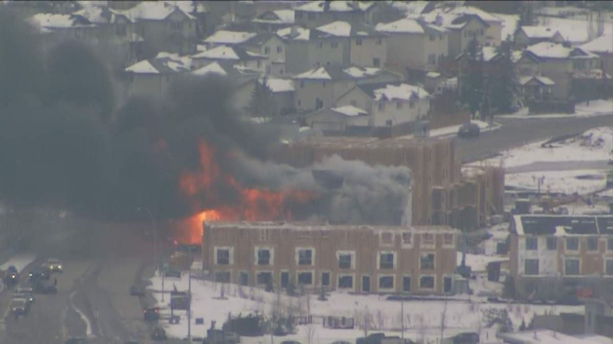 Fire crews are responding to a large fire that destroyed a building under construction in the northwest Calgary neighbourhood of Arbour Lake late Friday afternoon.